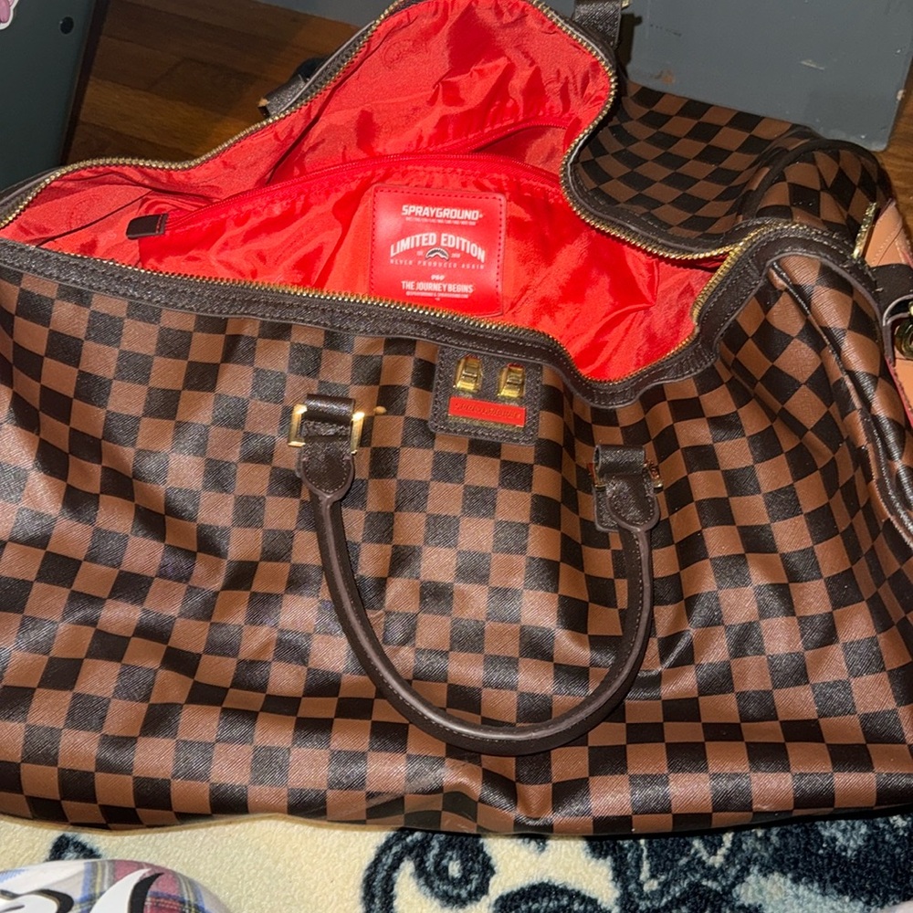 Spray ground duffel bag